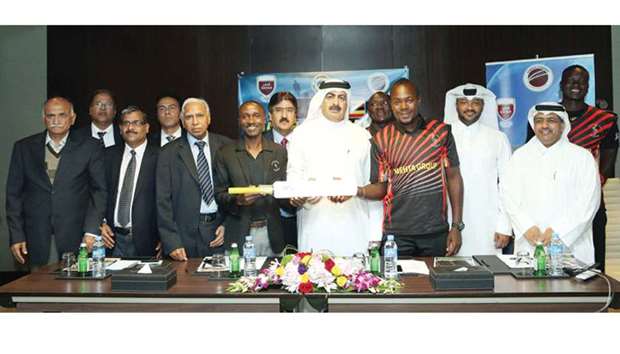 Qatar Cricket Association (QCA) President Yousef Jeham al-Kuwari, Uganda coach Steve Tikolo, players and other officials at a press conference yesterday.