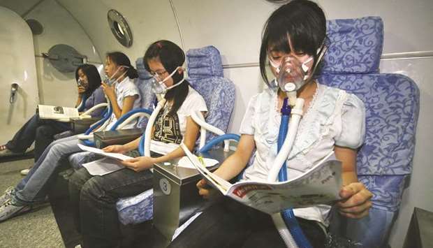 Chinese students study in a hyperbaric chamber prior to exams.