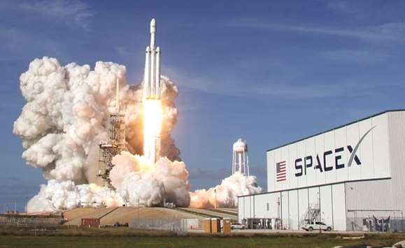 A SpaceX Falcon Heavy rocket lifts off from historic launch pad 39-A at the Kennedy Space Center in Cape Canaveral on Tuesday.