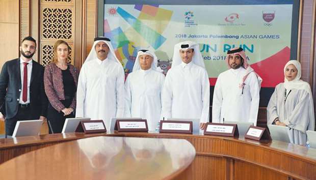 Qatar Olympic Committee (QOC) secretary-general Jassim al-Buenain (fifth from left) QOCu2019s Sport Affairs Department director Khaleel al-Jaber (third from left), OCA director general Husain al-Musallam (fourth from left) and other officials at yesterdayu2019s press conference.