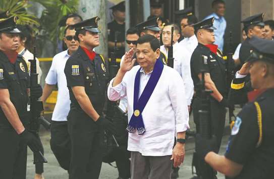 A recent photo shows President Rodrigo Duterte saluting as he arrives to attend the Bureau of Customs anniversary in Manila.