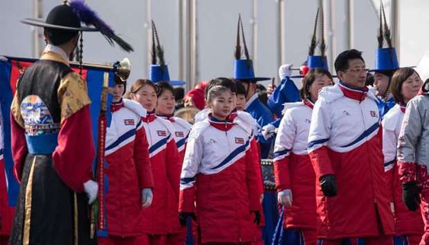 North Korea's athletes arrive for a welcoming ceremony at the athletes village of the 2018 Pyeongchang Winter Olympic games in Gangneung