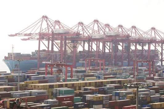 Maersku2019s Triple-E giant container ship, Majestic Maersk, is seen at the Yangshan Deep Water Port, part of the Shanghai Free Trade Zone. Chinau2019s January exports rose 11.1% from a year earlier, picking up from a 10.9% gain in December, official data showed yesterday.