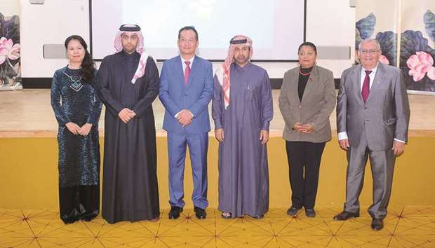 Dr al-Sulaiti and Nguyen flanked by other VIP guests