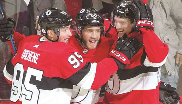 Ottawa Senators left wing Mike Hoffman (centre) celebrates with teammates after scoring in overtime against the Nashville Predators at Canadian Tire Centre. PICTURE: USA TODAY Sports