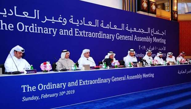 HE al-Emadi and other QNB directors at the bank's ordinary and extraordinary general meetings at the Ritz Carlton on Sunday. Picture: Ram Chand