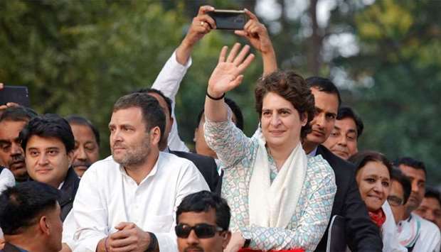 Priyanka Gandhi Vadra, a leader of India's main opposition Congress party and sister of the party president Rahul Gandhi, waves to her supporters during a roadshow in Lucknow