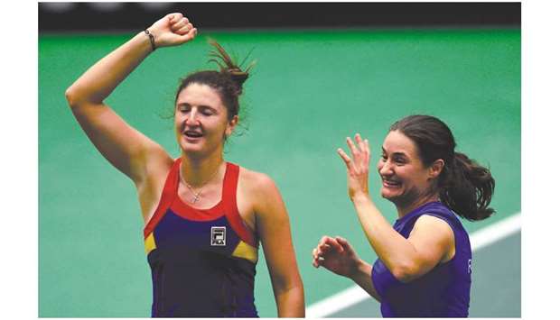 Romanian Irina-Camelia Begu (left) and Monica Niculescu celebrate after defeating the Czech Republic in their Fed Cup match in Ostrava. (AFP)