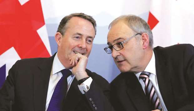 Britainu2019s Secretary of State for International Trade Liam Fox talks to Swiss Economy Minister Guy Parmelin after signing a bilateral agreement to continue trading on preferential terms after Brexit in Bern yesterday. u201cClearly there are those who believe that Brexit is the only economic factor applying to the UK economy. I think youu2019ll find that the predicted slowdown in a number of European economies is not disconnected from the slowdown, for example, in China,u201d Fox told a news conference in the Swiss capital.