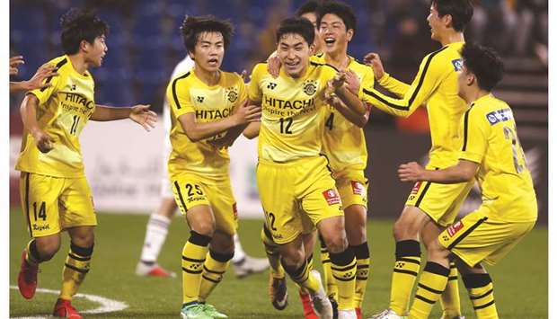 Kashiwa Reysol players celebrate after scoring a goal against Real Madrid during quarter-final match at the under-17 Al Kass International Cup yesterday. PICTURE: Jayaram