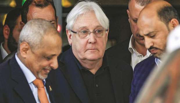 Martin Griffiths (centre), the UN special envoy for Yemen, arrives at Sanaa international airport, yesterday.