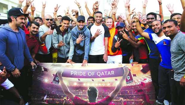 Qatar football team champions from Al-Sadd SC u2013 Akram Afif, Tarek Salman, and Salem al-Hajri u2013 joined Qatar Airways staff and families in the celebration.