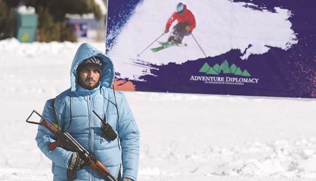 In this picture taken on January 29, a Pakistani security personnel keeps watch during the CAS Karakoram International Alpine Ski Cup.