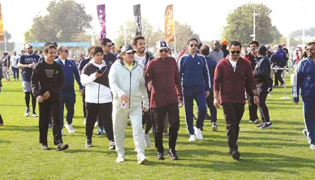 Qatargas officials and their families celebrate the National Sport Day.