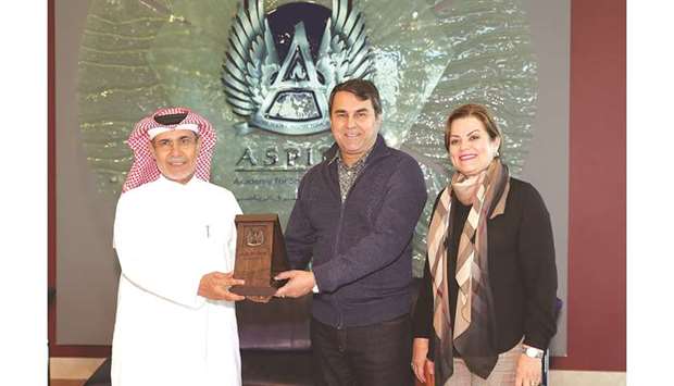 Aspire Academy Deputy Director General Ali Salem Afifa (left) with former President of Paraguay Luis Federico Franco Gomez and his wife.