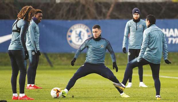 Chelseau2019s Eden Hazard (centre) trains with teammates ahead of the Europa League last 32 match against Malmo in London yesterday. (Reuters)