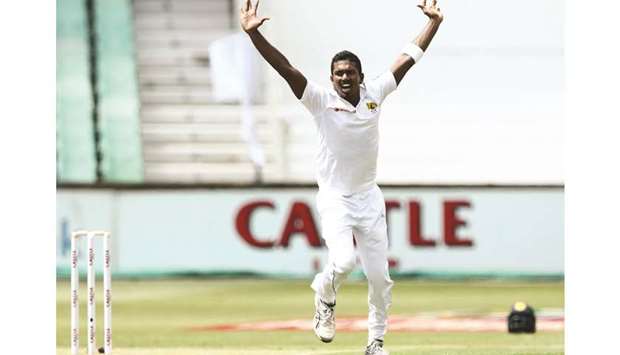 Sri Lankau2019s Vishwa Fernando reacts after taking wicket of South Africa batsman Dean Elgar in Durban yesterday. (AFP)