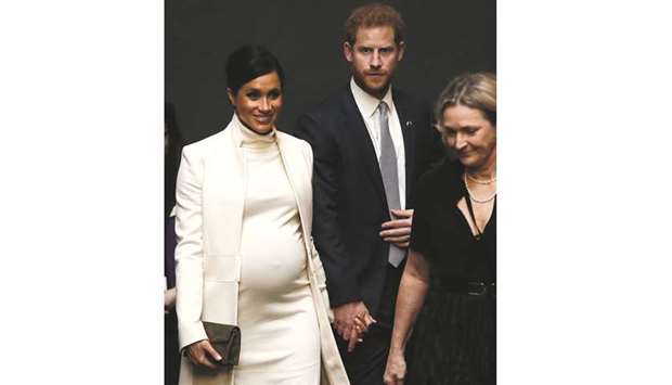 Prince Harry, Duke of Sussex, and Meghan, Duchess of Sussex, arrive to view the gala performance of The Wider Earth at the Natural History Museum in London. The Duke and Duchess viewed the theatrical production about the young Charles Darwinu2019s expedition on HMS Beagle.