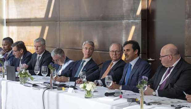 His Highness the Amir Sheikh Tamim bin Hamad Al-Thani attends a luncheon banquet accompanied by Wolfgang Ischinger, the President of Munich Security Conference and other dignitaries attending the conference.