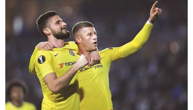 Chelseau2019s Ross Barkley (right) celebrates with teammate Olivier Giroud after scoring against Malmo in the UEFA Europa League round of 32, first-leg match in, Malmo, Sweden, on Thursday night. (AFP)