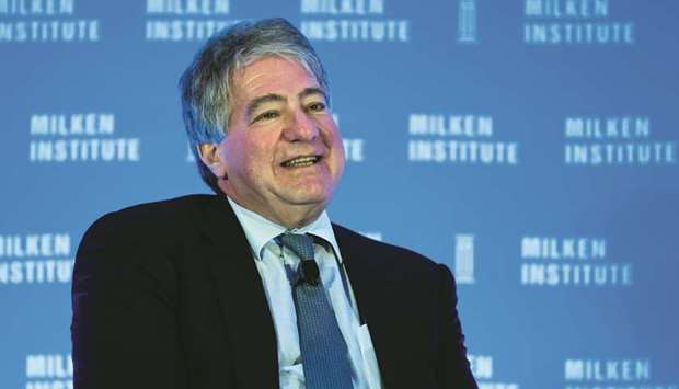 Leon Black, chairman and CEO of Apollo Global Management, speaks at a summit in Singapore (file). Blacku2019s private equity firm, Apollo Global Management, is working on a trifecta of transactions that could give it control of more than 40 stations from Atlanta to Seattle.