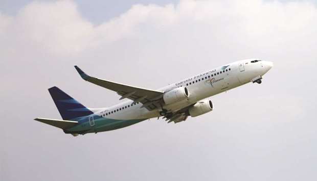 A Garuda airplane is seen taking off at Soekarno-Hatta International Airport in Cengkareng, Indonesia. The airline has slashed ticket prices by 20%, the company said on Thursday, following a public outcry over high fares and a call by the countryu2019s president for airlines to offer cheaper tickets.
