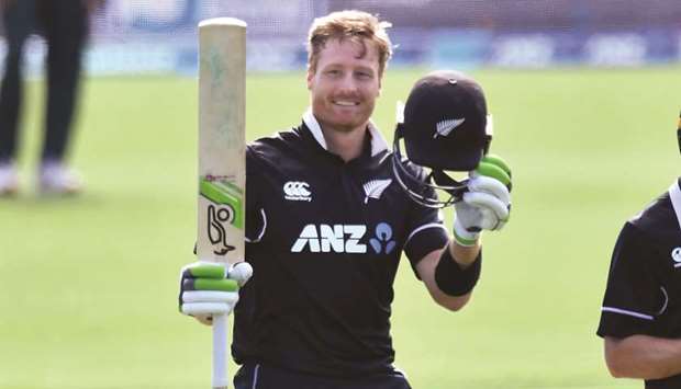 New Zealandu2019s Martin Guptill celebrates his century in the second ODI against and Bangladesh at Hagley Oval in Christchurch yesterday. (AFP)
