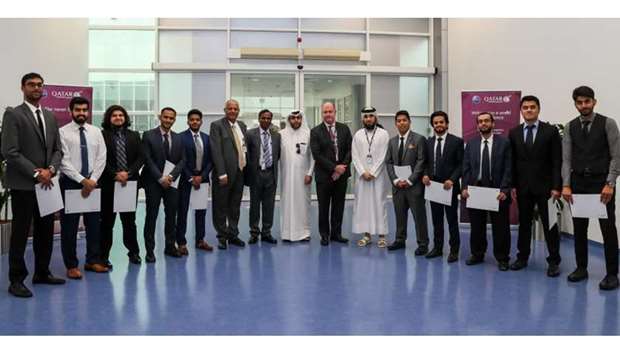 The graduates with officials.