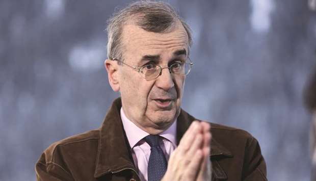 Francois Villeroy de Galhau, Governor of the Bank of France, gestures during a Bloomberg Television interview. Asked if poor economic data decreases the likelihood of a rate increase after the summer, Villeroy said the ECB will look at the numbers. u201cThe key question will be if the slowdown is temporary u2014 with a bounce-back during this year u2014 or more durable.u201d