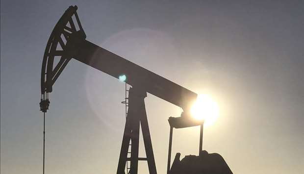 An oil pump is seen operating in the Permian Basin near Midland, Texas (file). Producers from Anadarko Petroleum Corp to Occidental Petroleum Corp are trimming capital budgets after a slip in oil prices in the fourth quarter.
