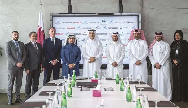 AZF CEO Mohamed Khalifa al-Suwaidi, and Saleh Al Hamad Al Mana Co chairman and managing director Hisham Saleh al-Mana with officials from both organisations.