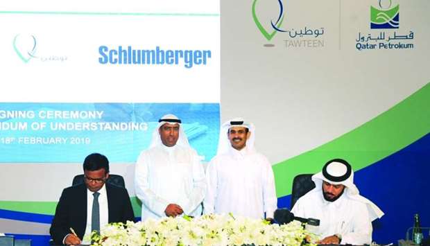 HE the Minister of State for Energy Affairs, Saad bin Sherida al-Kaabi and Maen Razouqi, NME Geomarket manager Schlumberger, witness the signing of the MoU by al-Rumaihi and Singh for collaboration in working towards the objectives of Tawteen to enhance localisation in the energy sector.