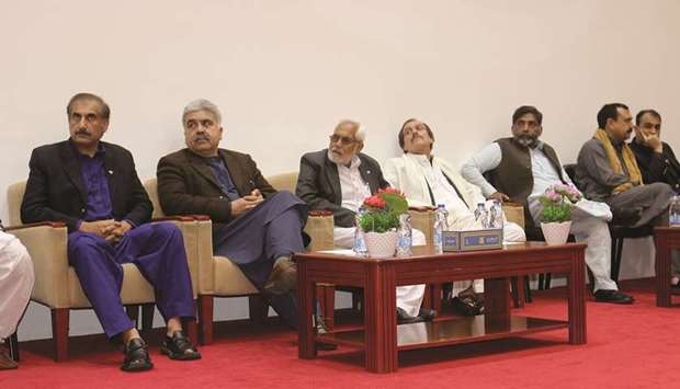 GROUP: Syed Ahsan Raza, Ambassador of Pakistan, left, with officials and dignitaries at the Pashto poetry symposium.