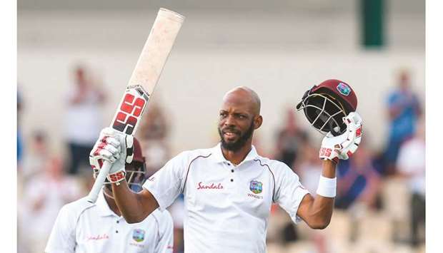 Roston Chase of West Indies celebrates his century on day four of the 3rd and final Test against England at Darren Sammy Cricket Ground, Gros Islet, Saint Lucia, on February 12, 2019. (AFP)