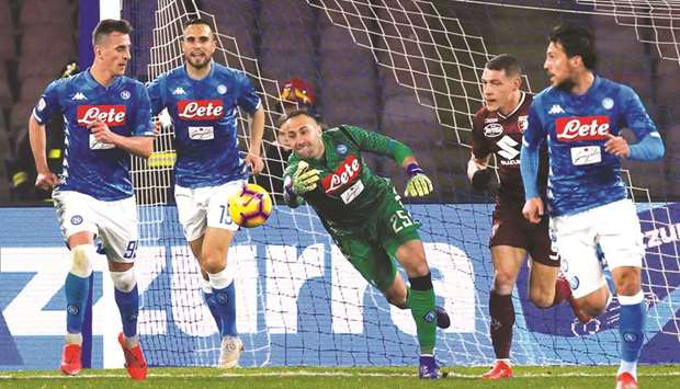 Napoliu2019s goalkeeper David Ospina (centre) throws the ball during the Serie A match against Torino at the Stadio San Paolo in Naples, Italy, on Sunday night. (Reuters)