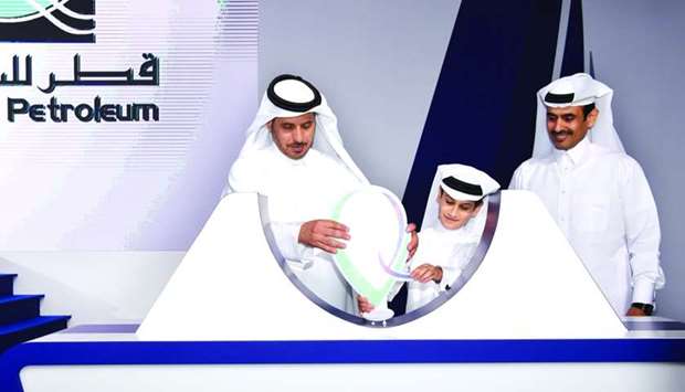 Sheikh Abdullah bin Nasser bin Khalifa al-Thani launches Qatar Petroleum's Tawteen initiative during a ceremony held in Doha Monday.