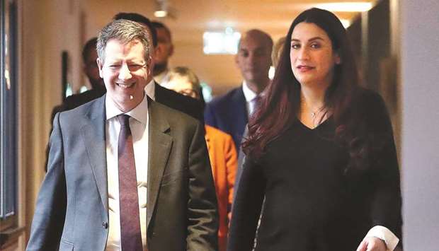 Former Labour party MPs Chris Leslie (left), and Luciana Berger arrive to speak at a press conference in London yesterday where they and colleagues announced their resignation from the Labour Party, and the formation of a new independent group of MPs.