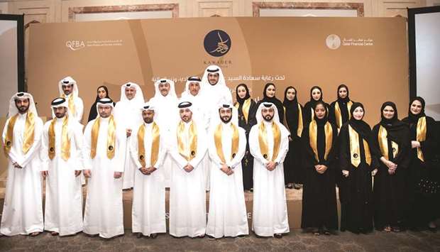 HE the Finance Minister Ali Sherif al-Emadi with Kawader graduates and QFBA officials.