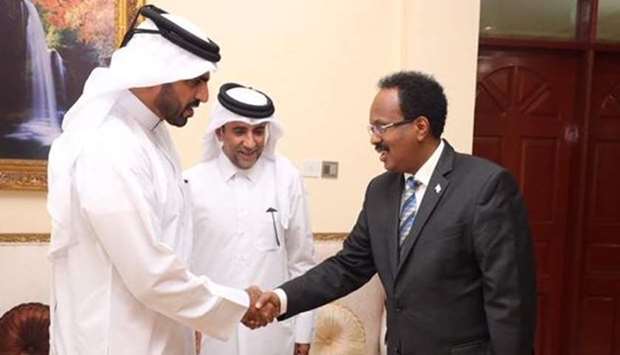 Mohamed Abdullah Farmajo, President of Somalia, meets with General Manager of Qatar Fund for Development, Khalifa Jassim al-Kuwari