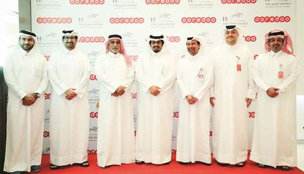 Ooredoo COO Yousuf Abdulla al-Kubaisi (third from left), Qatar Racing and Equestrian Club CEO Nasser bin Sherida al-Kaabi (centre) and officials during the announcement of Ooredoou2019s sponsorship of HH The Amiru2019s Silver Sword race at the upcoming HH The Amiru2019s Sword Festival.