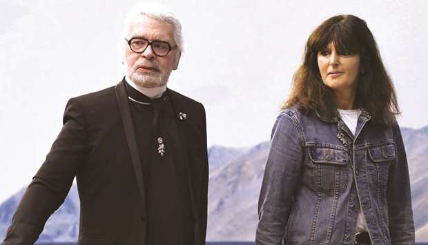 This picture taken on October 2 last year shows Lagerfeld with Viard.