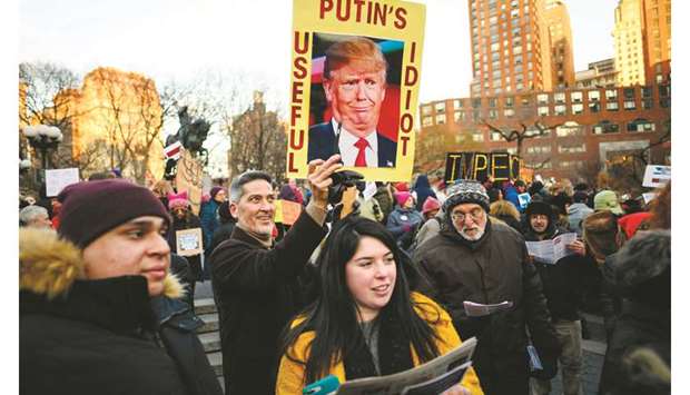 Demonstrators participate in a Presidentu2019s Day protest on Monday against President Donald Trumpu2019s immigration policy at the Union Square in New York City.