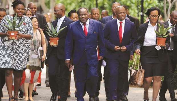 South African Finance Minister Tito Mboweni arrives to deliver his budget speech at Parliament in Cape Town yesterday.