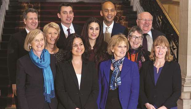 Former Conservative Party and now Independent MPs (front left-right) Sarah Wollaston, Heidi Allen and Anna Soubry pose for a photograph with the former Labour Party members of The Independent Group of MPs, Joan Ryan (front row right), (middle row left-right) Angela Smith, Luciana Berger, Ann Coffey (top row left-right) Chris Leslie, Gavin Shuker, Chuka Umunna and Mike Gapes after a press conference in central London yesterday.