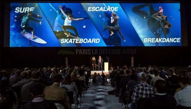 People attend a press conference on February 21, 2019 in Paris of the Organising Committee for 2024 Paris Olympics and Paralympics to announce that Breakdancing, skateboarding, climbing and surfing have been invited to join the games.