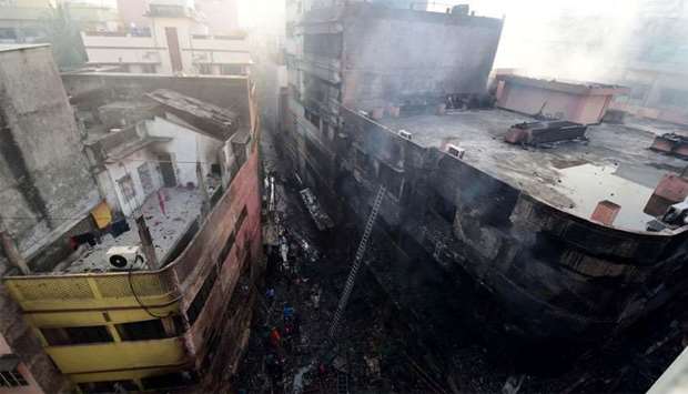 Burnt buildings are seen after a fire broke out in Dhaka.
