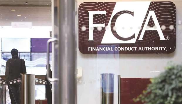 A logo sits on display in the headquarters of the Financial Conduct Authority (FCA) in the Canary Wharf business district in London. The FCA said yesterday that Hargreave Hale Ltd, Newton Investment Management Limited and River and Mercantile Asset Management LLP (RAMAM) breached competition law.