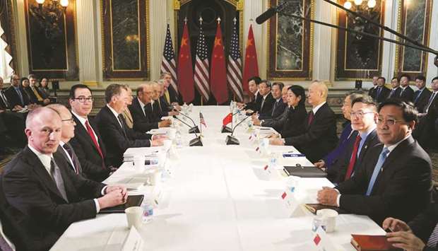 US Trade Representative Robert Lighthizer (4th from left); Treasury Secretary Steven Mnuchin (3rd from left); Commerce Secretary Wilbur Ross; White House economic adviser Larry Kudlow and White House trade adviser Peter Navarro pose for a photograph with Chinau2019s Vice Premier Liu He (4th from right), Chinese vice ministers and senior officials before the start of US-China trade talks at the White House in Washington yesterday.