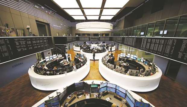 A view of the trading room at the Frankfurt Stock Exchange. The DAX 30 ended 0.2% up at 11,423.28 points yesterday.
