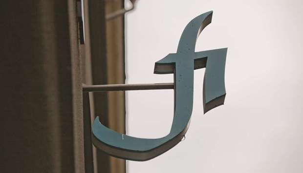 A logo hangs outside the headquarters of the Swedish Financial Supervisory Authority (FSA) in Stockholm (file). The FSA said information from TV news report had confirmed the risk that Swedish banks were being used for money laundering, even though the scope of the suspected transactions in Swedbanku2019s case appeared to be much smaller than those at Danske.